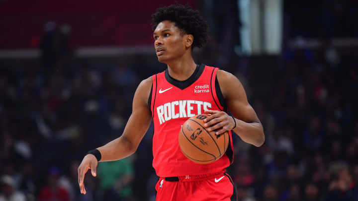 Apr 14, 2024; Los Angeles, California, USA; Houston Rockets forward Amen Thompson (1) controls the ball against the Los Angeles Clippers during the first half at Crypto.com Arena. Mandatory Credit: Gary A. Vasquez-USA TODAY Sports