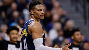 Jan 15, 2025; Denver, Colorado, USA; Denver Nuggets guard Russell Westbrook (4) reacts in the third quarter against the Houston Rockets at Ball Arena. Mandatory Credit: Isaiah J. Downing-Imagn Images