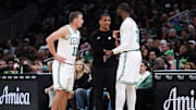 Oct 15, 2025; Boston, Massachusetts, USA; Boston Celtics head coach Joe Mazzulla talks with Boston Celtics guard Payton Pritchard (11) and Boston Celtics forward Jaylen Brown (7) during the first half against the Toronto Raptors at TD Garden. Mandatory Credit: Paul Rutherford-Imagn Images