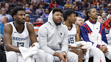 Mar 10, 2024; Oklahoma City, Oklahoma, USA; Memphis Grizzlies forward Jaren Jackson Jr. (13), guard Marcus Smart (36), forward GG Jackson (45) and guard Ja Morant (12) watch their team play against the Oklahoma City Thunder from the bench during the second half at Paycom Center. Mandatory Credit: Alonzo Adams-Imagn Images
