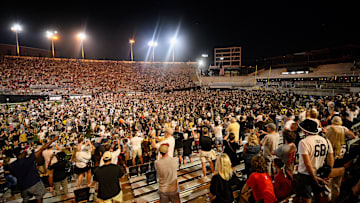 Oct 5, 2024; Nashville, Tennessee, USA;  Vanderbilt Commodores fans rush the field after a victory over the Alabama Crimson Tide at FirstBank Stadium. Mandatory Credit: Steve Roberts-Imagn Images