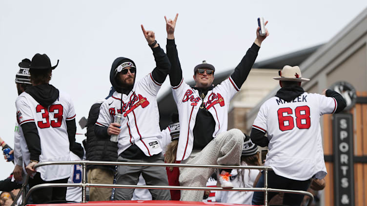 Nov 5, 2021; Atlanta, GA, USA; Atlanta Braves players from left A.J. Minter , Josh Tomlin, Luke