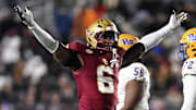 Nov 30, 2024; Chestnut Hill, Massachusetts, USA; Boston College Eagles defensive end Donovan Ezeiruaku (6) reacts after a sack against the Pittsburgh Panthers during the second half at Alumni Stadium. Mandatory Credit: Brian Fluharty-Imagn Images