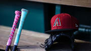Jun 7, 2023; Washington, District of Columbia, USA; A general view of an Arizona Diamondbacks hat, glove, and bats in the dugout during the fifth inning of the game against the Washington Nationals at Nationals Park. Mandatory Credit: Scott Taetsch-Imagn Images