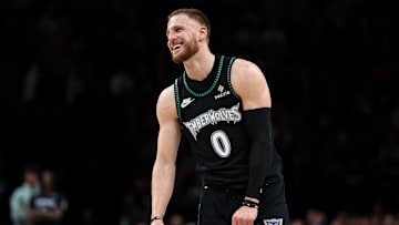 Nov 30, 2025; Minneapolis, Minnesota, USA; Minnesota Timberwolves guard Donte DiVincenzo (0) reacts during the second half against the San Antonio Spurs at Target Center. Mandatory Credit: Matt Krohn-Imagn Images