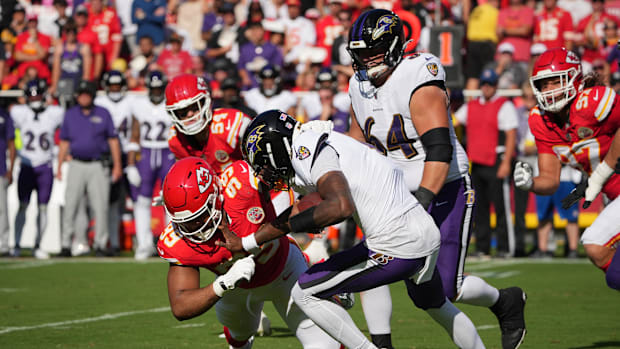 Baltimore Ravens quarterback Lamar Jackson (8) is sacked by Kansas City Chiefs defensive tackle Jerry Tillery (99) in Week 4.