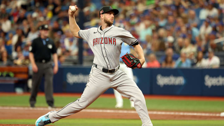 Aug 18, 2024; St. Petersburg, Florida, USA;  Arizona Diamondbacks starting pitcher Merrill Kelly (29) throws a pitch against the Tampa Bay Rays during the first inning at Tropicana Field. Mandatory Credit: Kim Klement Neitzel-USA TODAY Sports