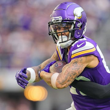 Nov 12, 2023; Minneapolis, Minnesota, USA; Minnesota Vikings wide receiver Jalen Nailor (83) catches a pass against the New Orleans Saints cornerback Alontae Taylor (1) in the third quarter at U.S. Bank Stadium.