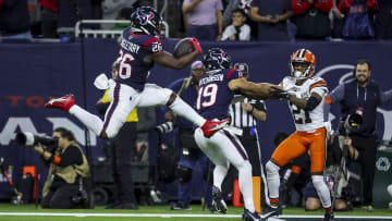 Jan 13, 2024; Houston, Texas, USA; Houston Texans running back Devin Singletary (26) lunges for a touch down during the third quarter in a 2024 AFC wild card game at NRG Stadium. Mandatory Credit: Troy Taormina-USA TODAY Sports