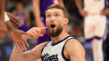 Mar 14, 2025; Phoenix, Arizona, USA; Sacramento Kings forward Domantas Sabonis (11) against the Phoenix Suns at Footprint Center. Mandatory Credit: Mark J. Rebilas-Imagn Images