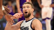 Mar 14, 2025; Phoenix, Arizona, USA; Sacramento Kings forward Domantas Sabonis (11) against the Phoenix Suns at Footprint Center. Mandatory Credit: Mark J. Rebilas-Imagn Images