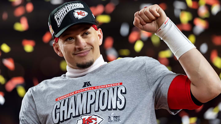 Jan 26, 2025; Kansas City, MO, USA; Confetti falls as Kansas City Chiefs quarterback Patrick Mahomes celebrates after defeating the Buffalo Bills during the AFC Championship game at GEHA Field at Arrowhead Stadium. Mandatory Credit: Mark J. Rebilas-Imagn Images