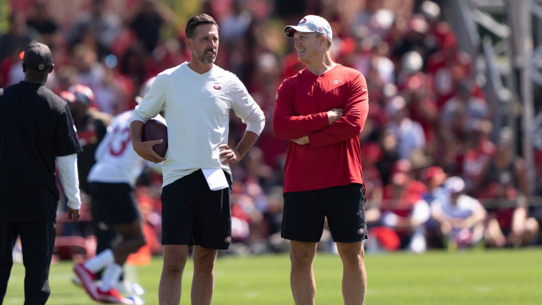 Jul 27, 2022; Santa Clara, CA, USA; San Francisco 49ers head coach Kyle Shanahan (left) and general manager John Lynch watches the players during Training Camp at the SAP Performance Facility near Levi Stadium. Mandatory Credit: Stan Szeto-USA TODAY Sports