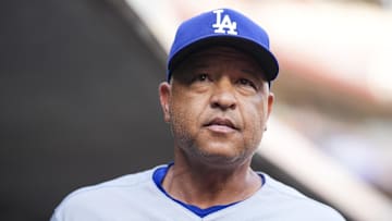 Jul 29, 2025; Cincinnati, Ohio, USA;  Los Angeles Dodgers manager Dave Roberts (30) stands in the dugout before the game against the Cincinnati Reds at Great American Ball Park. Mandatory Credit: Aaron Doster-Imagn Images