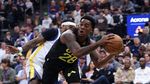 October 25, 2024; Salt Lake City, Utah, United States; Utah Jazz forward Brice Sensabaugh (28) looks to pass against Golden State Warri