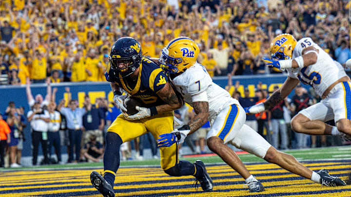 Current WVU football tight end Grayson Barnes hauls in a touchdown pass against Pitt in The Backyard Brawl at Milan Puskar Stadium on September 13, 2025.