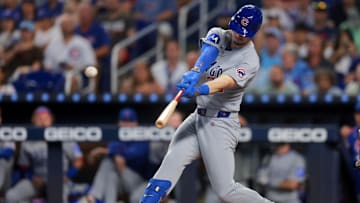 May 20, 2025; Miami, Florida, USA; Chicago Cubs right fielder Kyle Tucker (30) hits a solo home run against the Miami Marlins during the first inning at loanDepot Park. 