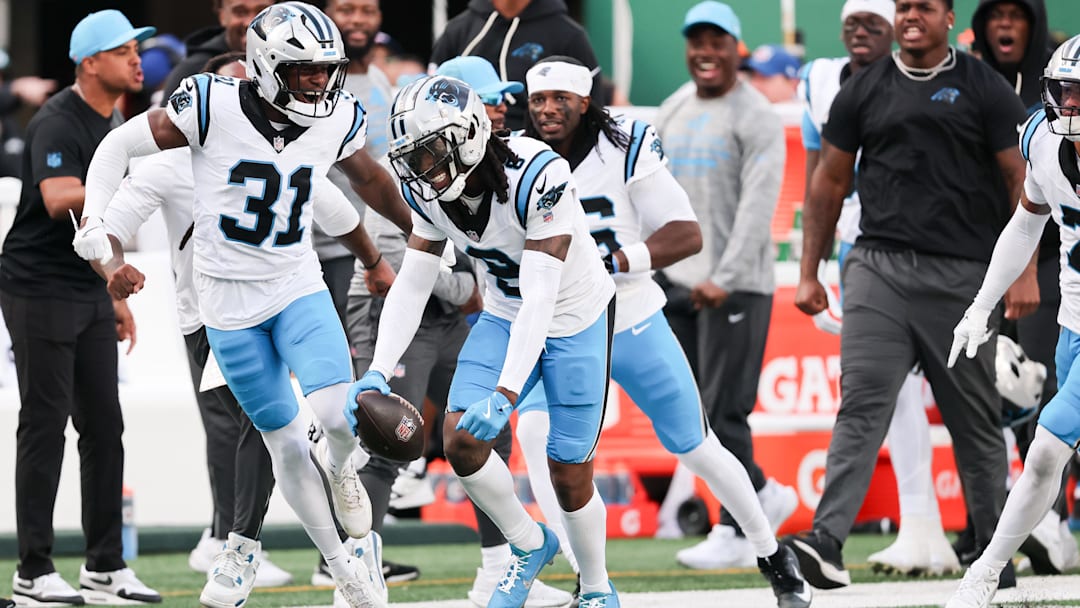 Carolina Panthers cornerback Jaycee Horn celebrates an interception intended for New York Jets wide receiver Josh Reynolds.