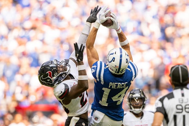 Indianapolis Colts wide receiver Alec Pierce catches a long pass in a blue jersey.