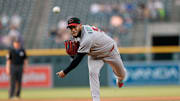 Aug 14, 2025; Denver, Colorado, USA; Arizona Diamondbacks starting pitcher Eduardo Rodriguez (57) pitches in the first inning against the Colorado Rockies at Coors Field. Mandatory Credit: Isaiah J. Downing-Imagn Images