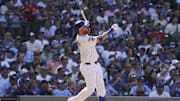 Aug 3, 2025; Chicago, Illinois, USA; Chicago Cubs pinch hitter Justin Turner (3) hits a two-run game winning home run against the Baltimore Orioles during the ninth inning at Wrigley Field. Mandatory Credit: David Banks-Imagn Images