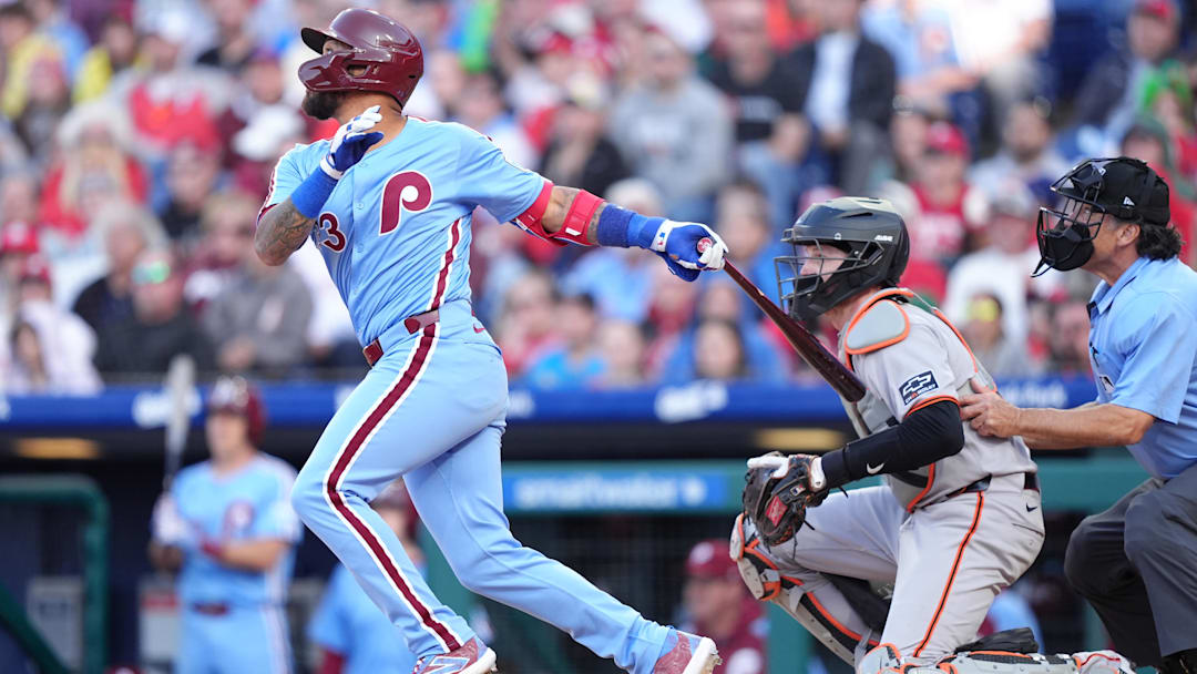 Apr 17, 2025; Philadelphia, Pennsylvania, USA; Philadelphia Phillies infielder Edmundo Sosa (33) hits a sacrifice fly against the San Francisco Giants in the eighth inning at Citizens Bank Park. Apr 17, 2025; Philadelphia, Pennsylvania, USA; Philadelphia Phillies infielder Edmundo Sosa (33) hits a sacrifice fly against the San Francisco Giants in the eighth inning at Citizens Bank Park.