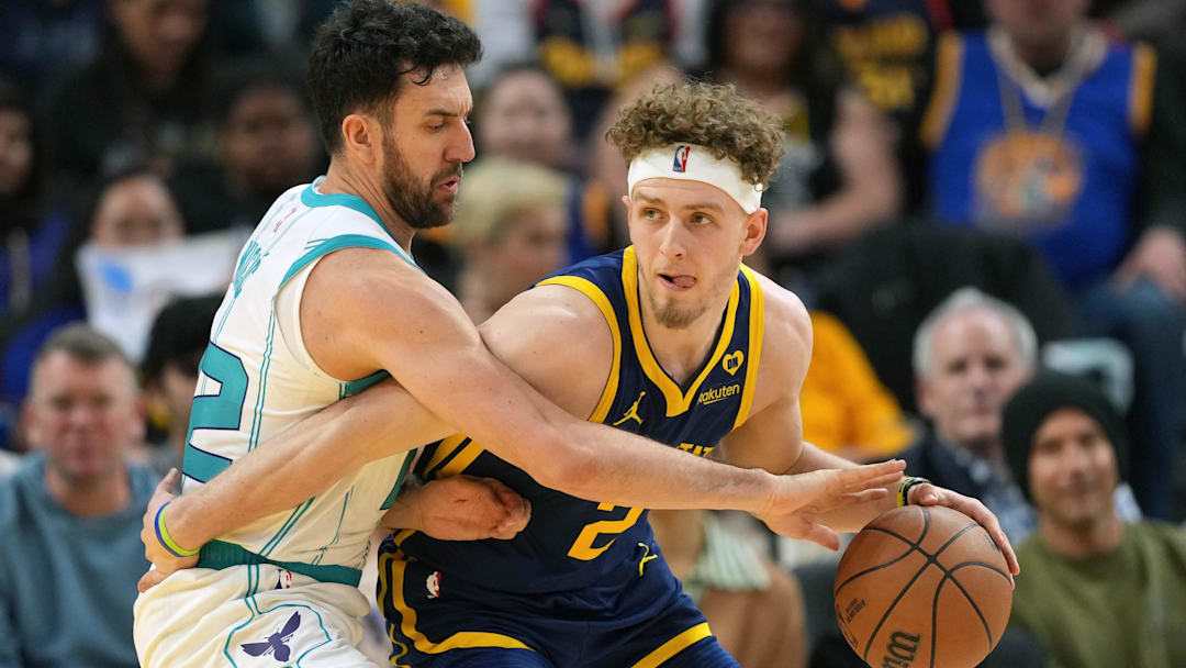 Feb 23, 2024; San Francisco, California, USA; Golden State Warriors guard Brandin Podziemski (right)