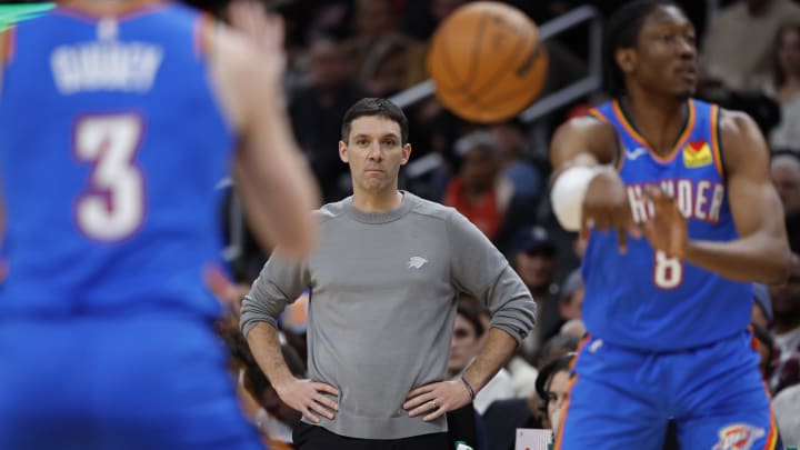 Jan 8, 2024; Washington, District of Columbia, USA; Oklahoma City Thunder head coach Mark Daigneault (M) watches as Thunder forward Jalen Williams (8) passes the ball to Thunder guard Josh Giddey (3) against the Washington Wizards in the second quarter at Capital One Arena. Mandatory Credit: Geoff Burke-USA TODAY Sports