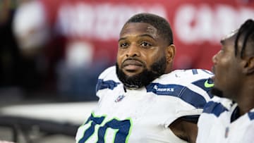 Dec 8, 2024; Glendale, Arizona, USA; Seattle Seahawks guard Laken Tomlinson (70) against the Arizona Cardinals at State Farm Stadium. Mandatory Credit: Mark J. Rebilas-Imagn Images