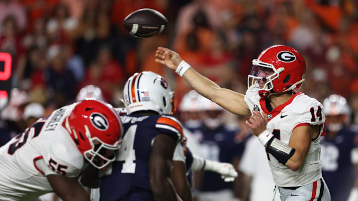 Oct 11, 2025; Auburn, Alabama, USA; Georgia Bulldogs quarterback Gunner Stockton (14) throws a pass during the first quarter against the Auburn Tigers at Jordan-Hare Stadium. Mandatory Credit: John Reed-Imagn Images Oct 11, 2025; Auburn, Alabama, USA; Georgia Bulldogs quarterback Gunner Stockton (14) throws a pass during the first quarter against the Auburn Tigers at Jordan-Hare Stadium. Mandatory Credit: John Reed-Imagn Images