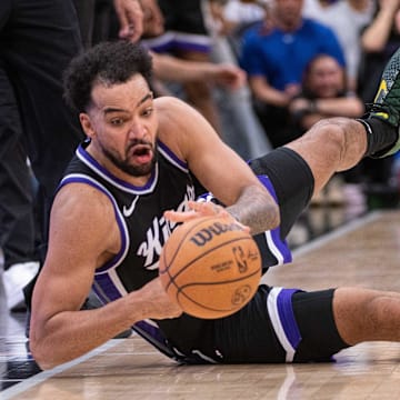 Apr 9, 2025; Sacramento, California, USA; Sacramento Kings forward Trey Lyles (41) attempts to control the ball during the fourth quarter of the game against the Denver Nuggets at Golden 1 Center. Mandatory Credit: Ed Szczepanski-Imagn Images