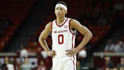 Dec 22, 2024; Norman, Oklahoma, USA; Oklahoma Sooners guard Jeremiah Fears (0) during a break in the first half against the Central Arkansas Bears at Lloyd Noble Center. Mandatory Credit: Alonzo Adams-Imagn Images