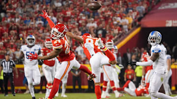 Sep 7, 2023; Kansas City, Missouri, USA; Kansas City Chiefs wide receiver Skyy Moore (24) misses a pass as Detroit Lions cornerback Cameron Sutton (1) looks on during the second half at GEHA Field at Arrowhead Stadium. Mandatory Credit: Denny Medley-Imagn Images