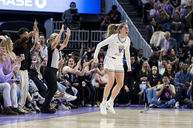 Golden State Valkyries guard Kate Martin reacts after hitting a three-point shot. 