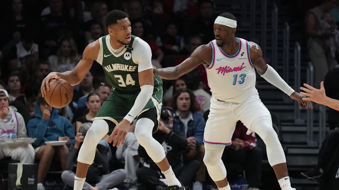 Apr 5, 2025; Miami, Florida, USA;  Milwaukee Bucks forward Giannis Antetokounmpo (34) looks to shoot as Miami Heat center Bam Adebayo (13). Mandatory Credit: Jim Rassol-Imagn Images