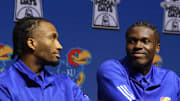 Oct 22, 2025; Kansas City, MO, USA; Kansas guard Darryn Peterson and forward Flory Bidunga react during Big 12 Menís Basketball media day at T-Mobile Center. 