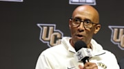 Oct 22, 2025; Kansas City, MO, USA; UCF head coach Johnny Dawkins speaks to media during Big 12 Menís Basketball media day at T-Mobile Center. Mandatory Credit: Sophia Scheller-Imagn Images