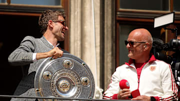Bayern Munich forward Thomas Muller celebrating his final Bundesliga title.