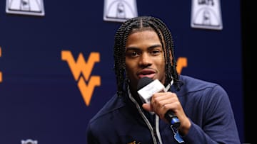 Oct 22, 2025; Kansas City, MO, USA; West Virginias Jasper Floyd speaks to media during Big 12 Menís Basketball media day at T-Mobile Center. Mandatory Credit: Sophia Scheller-Imagn Images