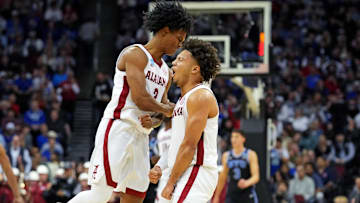 Mar 27, 2025; Newark, NJ, USA; Alabama Crimson Tide guard Latrell Wrightsell Jr. (3) and Alabama Crimson Tide guard Mark Sears (1) celebrate during the second half against the Brigham Young Cougars during an East Regional semifinal of the 2025 NCAA tournament at Prudential Center. Mandatory Credit: Robert Deutsch-Imagn Images