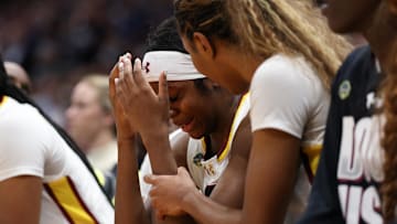 Apr 6, 2025; Tampa, FL, USA; South Carolina Gamecocks guard Raven Johnson (25) cries on the bench during the second half against the Connecticut Huskies of the national championship of the women's 2025 NCAA tournament at Amalie Arena. Mandatory Credit: Nathan Ray Seebeck-Imagn Images