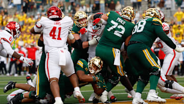 Nov 29, 2025; Waco, Texas, USA;  Baylor Bears running back Joseph Dodds (27) carries the ball for a touchdown during the second half against the Houston Cougars at McLane Stadium. Mandatory Credit: Chris Jones-Imagn Images