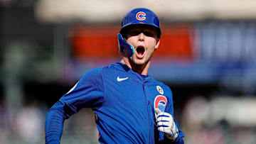Sep 15, 2024; Denver, Colorado, USA; Chicago Cubs center fielder Pete Crow-Armstrong (52) celebrates as he rounds the bases on a two run home run in the ninth inning against the Colorado Rockies at Coors Field