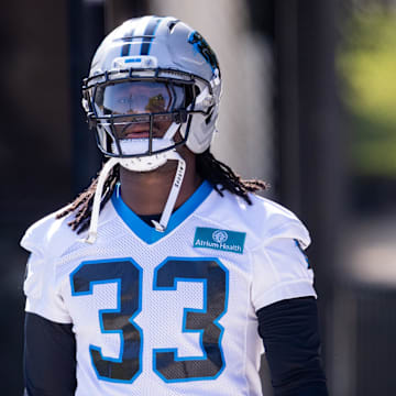 Jul 24, 2025; Charlotte, NC, USA; Carolina Panthers linebacker Princely Umanmielen (33) walks up to training camp. Mandatory Credit: Scott Kinser-Imagn Images