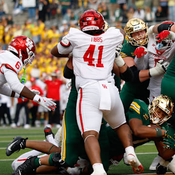 Nov 29, 2025; Waco, Texas, USA;  Baylor Bears running back Joseph Dodds (27) carries the ball for a touchdown during the second half against the Houston Cougars at McLane Stadium. Mandatory Credit: Chris Jones-Imagn Images