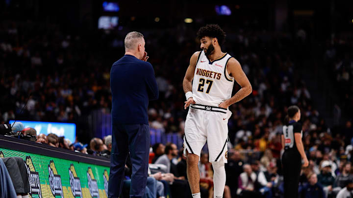 Dec 27, 2024; Denver, Colorado, USA; Denver Nuggets guard Jamal Murray (27) talks with head coach Michael Malone in the fourth quarter against the Cleveland Cavaliers at Ball Arena. Mandatory Credit: Isaiah J. Downing-Imagn Images