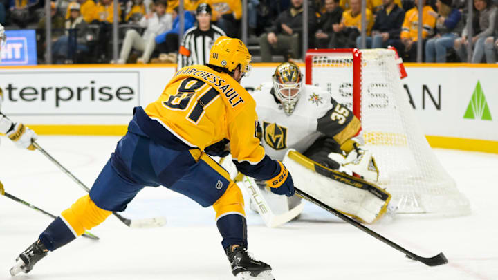 Jan 14, 2025; Nashville, Tennessee, USA;  Vegas Golden Knights goaltender Ilya Samsonov (35) blocks the shot of Nashville Predators center Jonathan Marchessault (81) during the first period at Bridgestone Arena. Mandatory Credit: Steve Roberts-Imagn Images