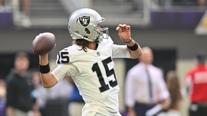 Aug 10, 2024; Minneapolis, Minnesota, USA; Las Vegas Raiders quarterback Gardner Minshew (15) throws a pass against the Minnesota Vikings during the second quarter at U.S. Bank Stadium. Mandatory Credit: Jeffrey Becker-USA TODAY Sports