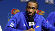 Oct 22, 2025; Kansas City, MO, USA; Kansas guard Darryn Peterson speaks to media during Big 12 Menís Basketball media day at T-Mobile Center. Mandatory Credit: Sophia Scheller-Imagn Images