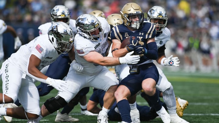 Oct 21, 2023; Annapolis, Maryland, USA;  Air Force Falcons defensive lineman Payton Zdroik (96) tackles Navy Midshipmen fullback Alex Tecza (46) in the first half at Navy-Marine Corps Memorial Stadium. Mandatory Credit: Tommy Gilligan-USA TODAY Sports